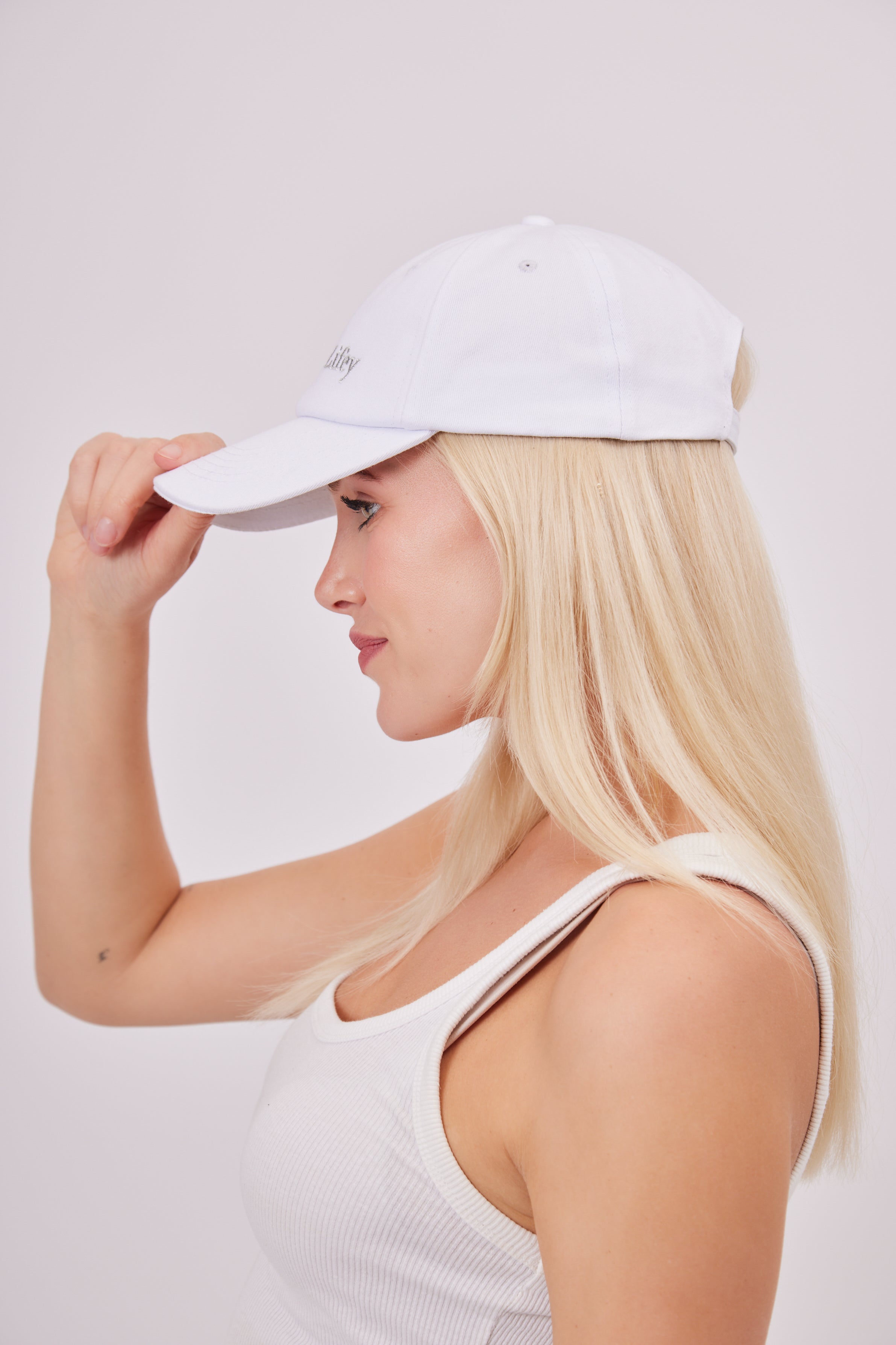 Wifey For Lifey Baseball Cap in White and Silver | bride tribe | bridal accessories | hen do accessories | hen party accessories | bachelorette accessories | hen do hat | hen party hat | bride hat | bridal hat | embroidered bride cap | wedding accessories | bride accessories | wedding party | wedding party accessories