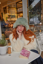 Women's stylish and ultra fluffy bucket hat made with soft faux fur in mint green - My Accessories London